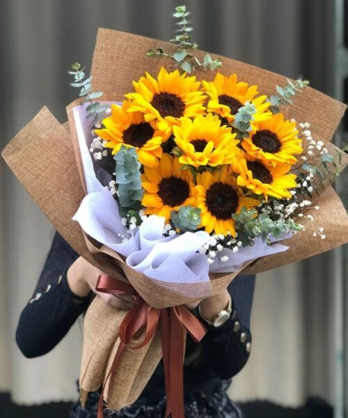 bó hoa hướng dương gói giấy báo
